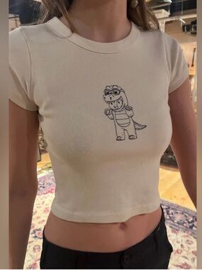 Brandy Melville John Galt Ashlyn Dinosaur Costume Graphic Cropped Baby Tee. S
